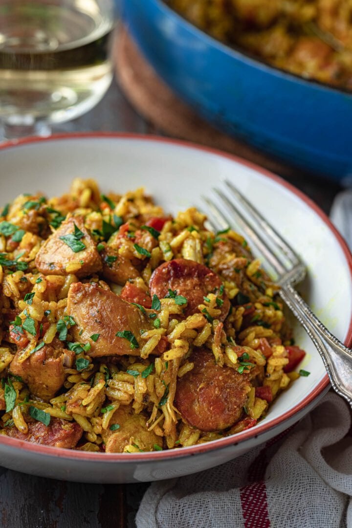 A close up photo of a plate of Galinhada.