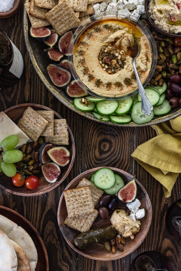 Serving a mezze platter. You can see the large platter and two individual servings.