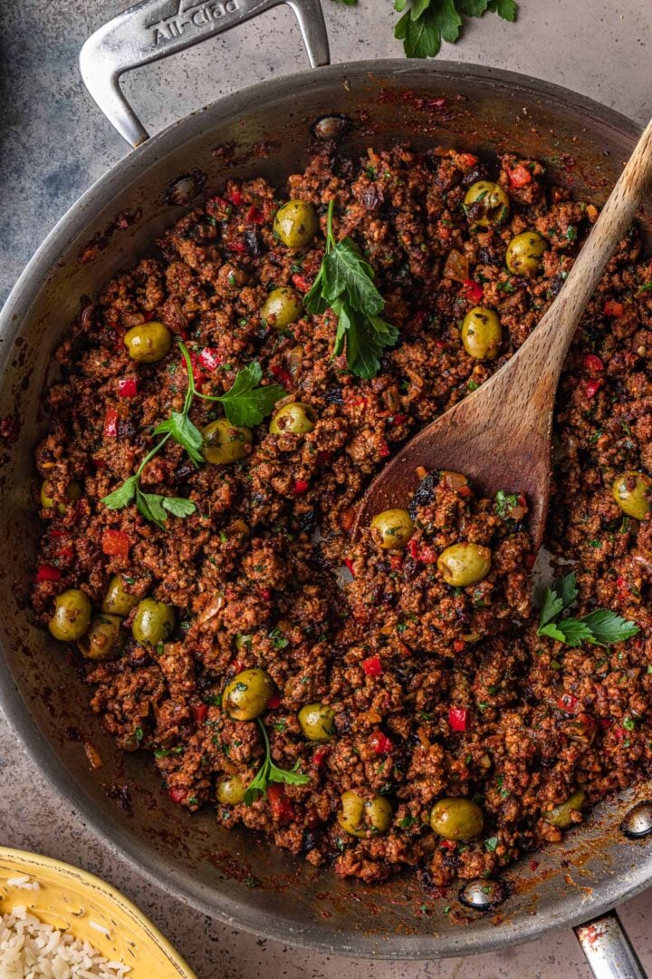 A close up shot of a pan of Cuban picadillo.