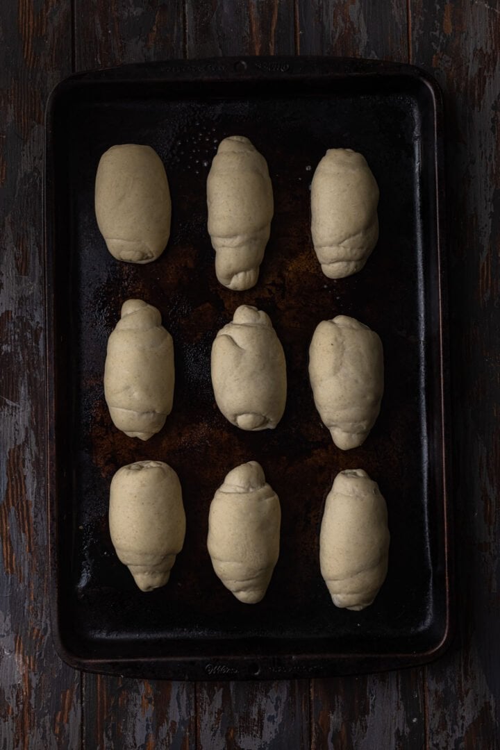 Pão francês rolls proofed and ready to bake.