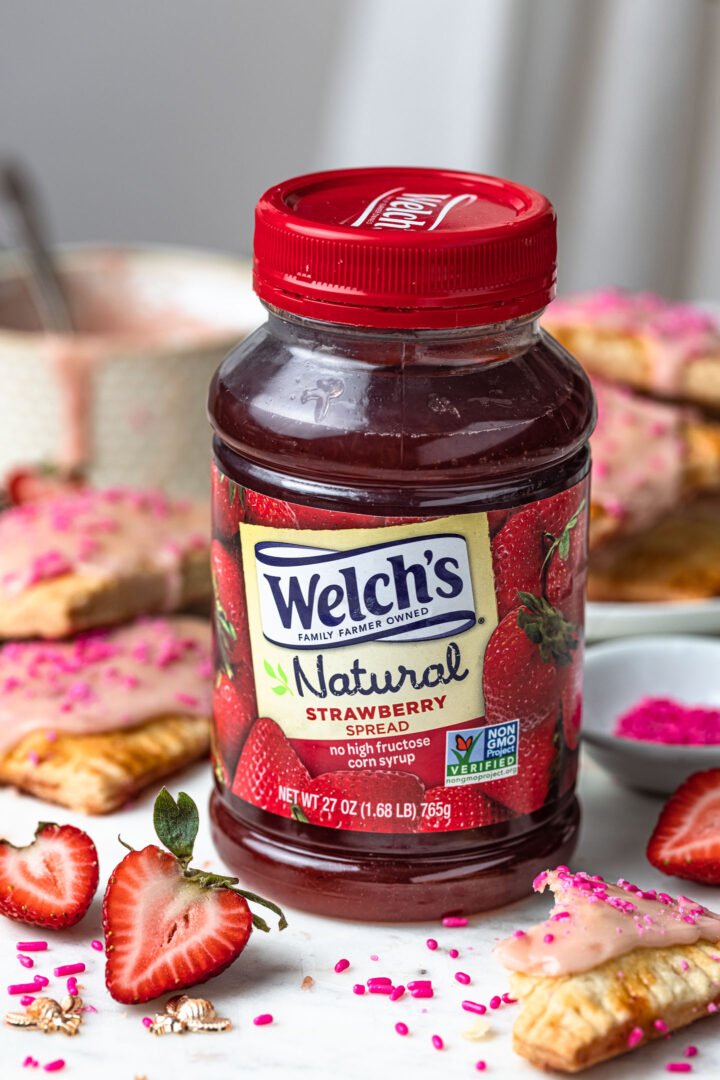 A jar of Welch's strawberry spread.