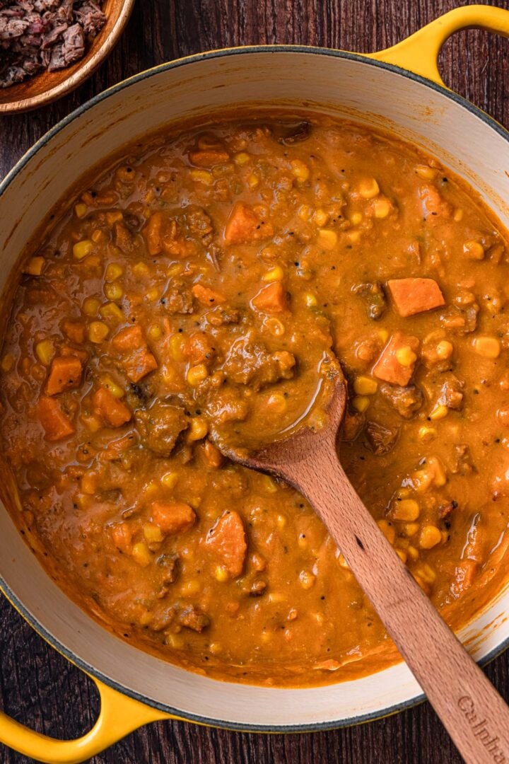 A pot of sweet potato chowder soup.