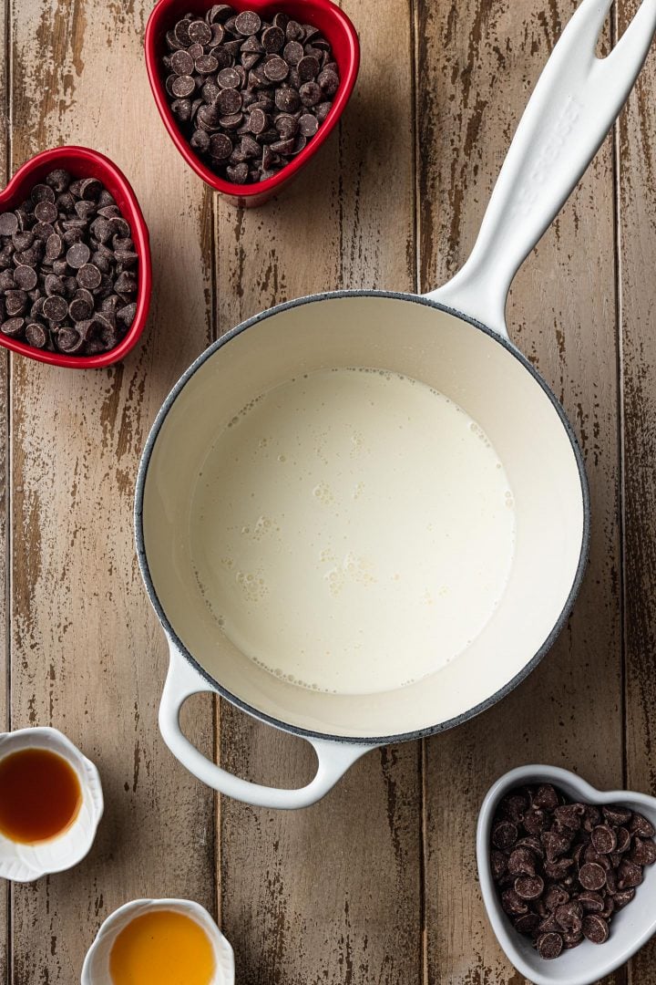 Heavy cream in a saucepan.