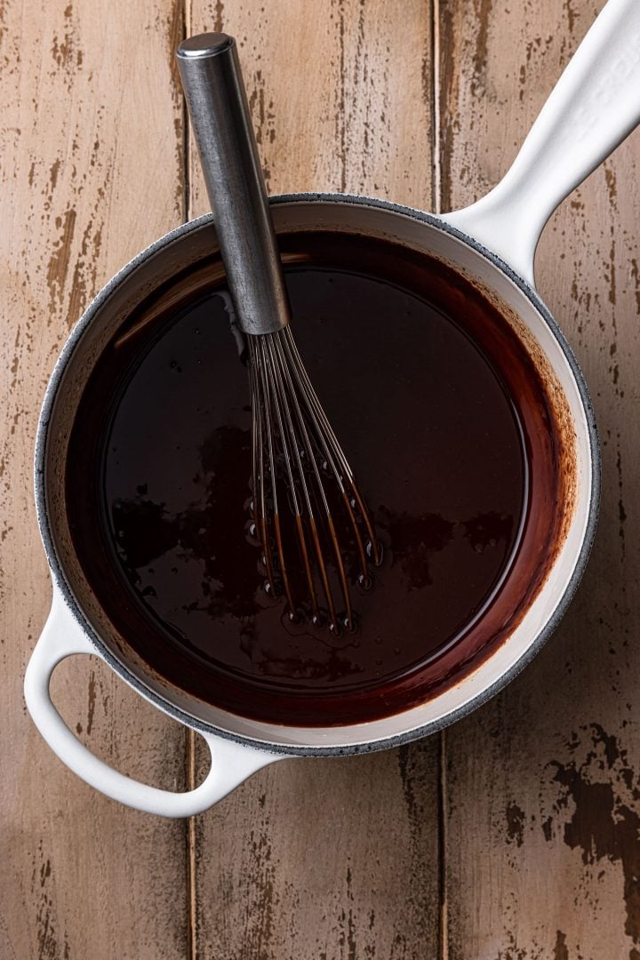 Chocolate fondue in a saucepan.