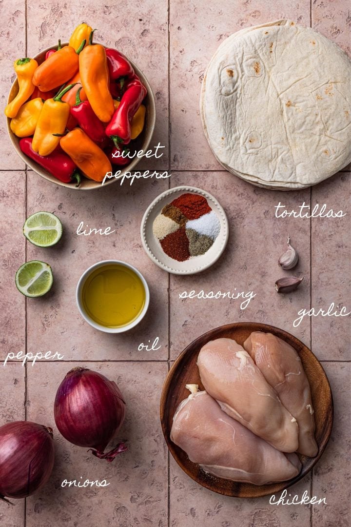 A photo of all the ingredients that you'll need to make this sheet pan chicken fajitas recipe.