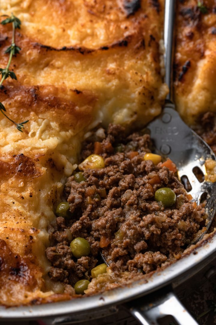A close-up photo of the meat filling in a shepherd's pie.