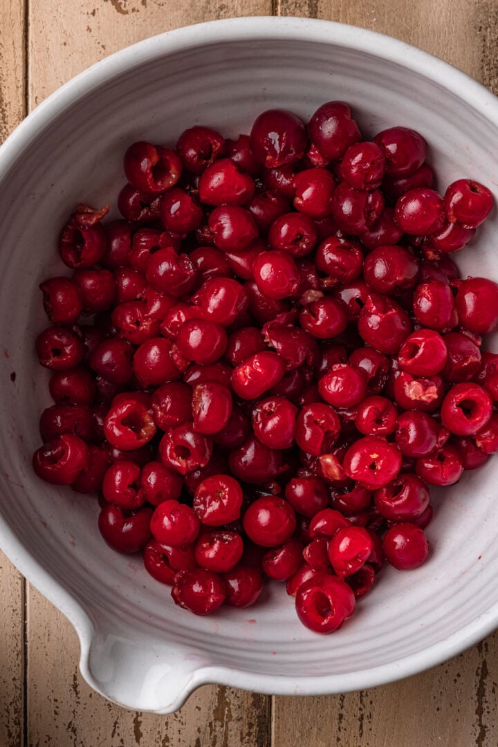A bowl of pitted cherries.
