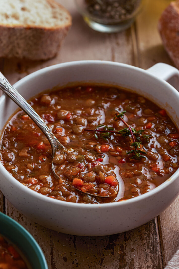 A closeup photo of a bowl of lentil soup.