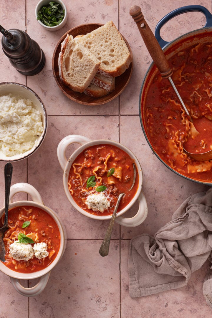 Easy creamy lasagna soup served with crusty bread and ricotta topping