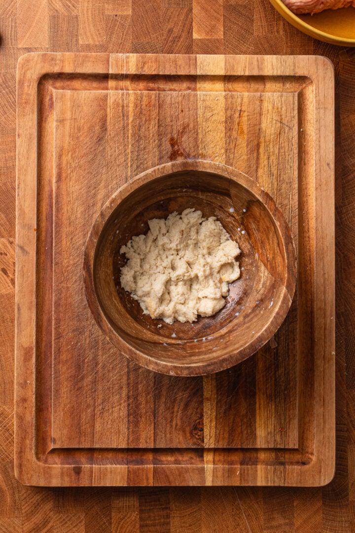Soaked bread mixture in a bowl for chicken piccata meatballs, used to keep the meatballs tender