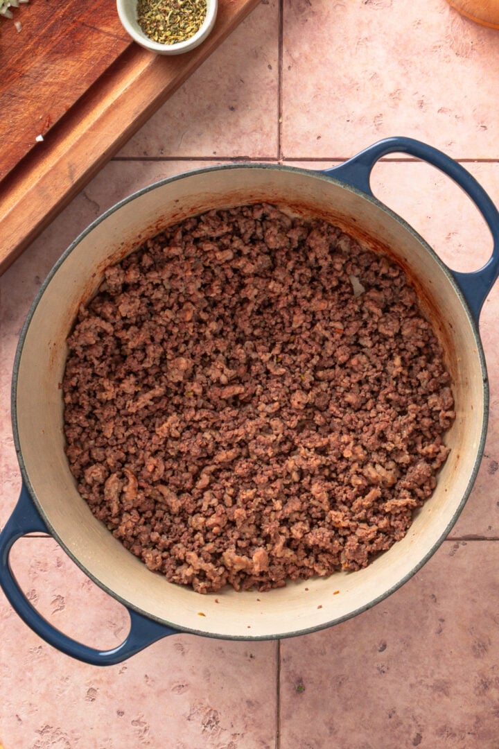 Ground beef and pork browning in pot for lasagna soup